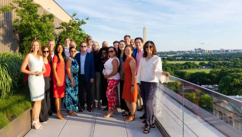Lever Fund team gathers with guests on roof
